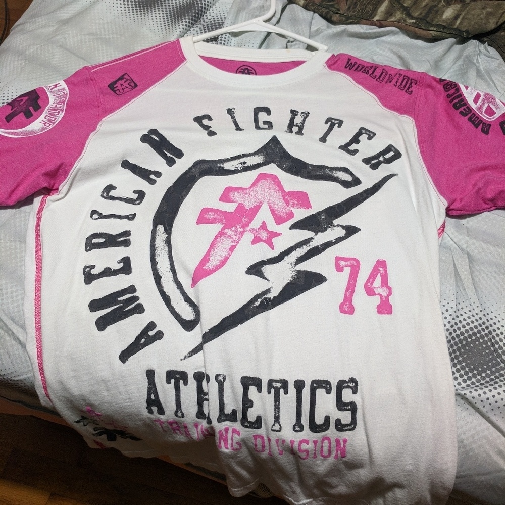'lot of' small shirts and size 30 bke shorts